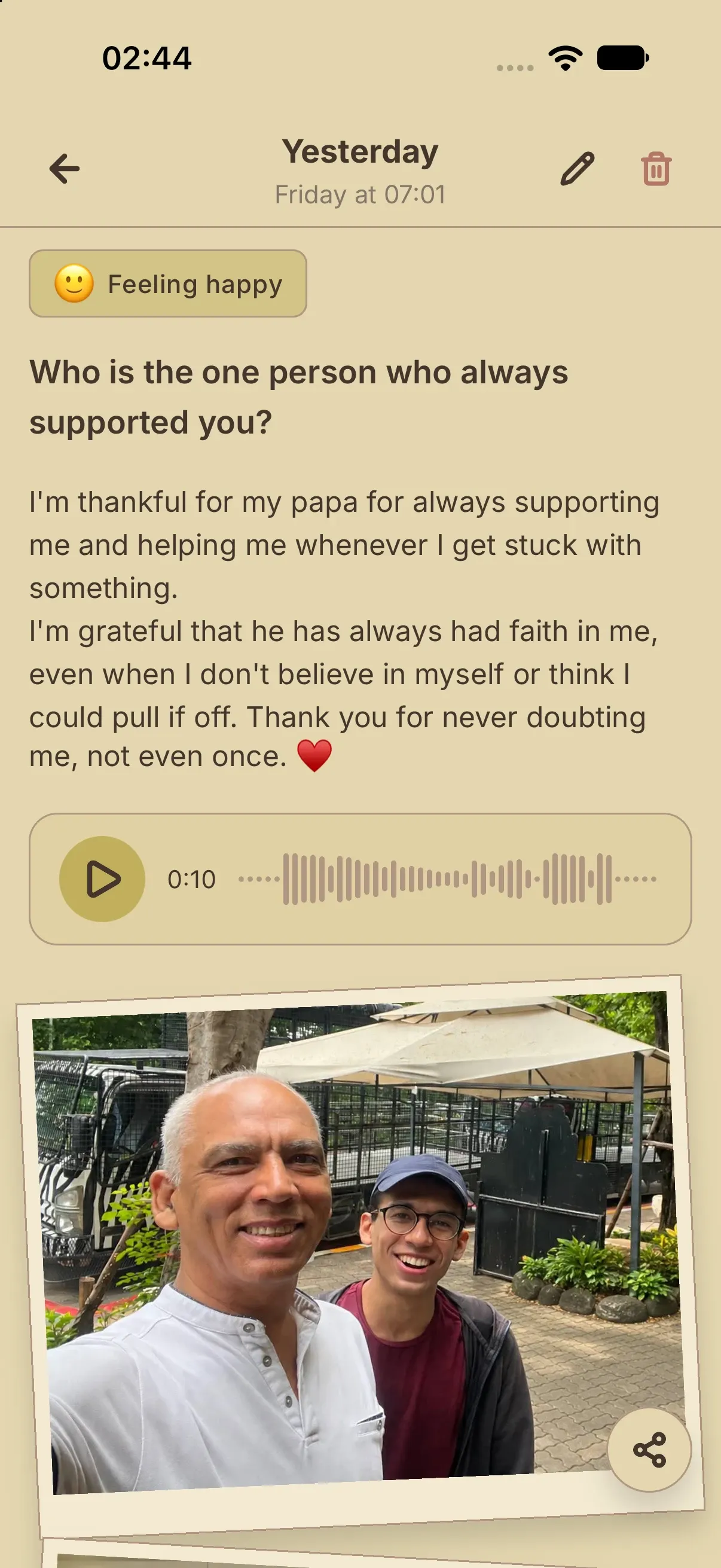 A journal memory with a mood, voice recording, and a framed photo